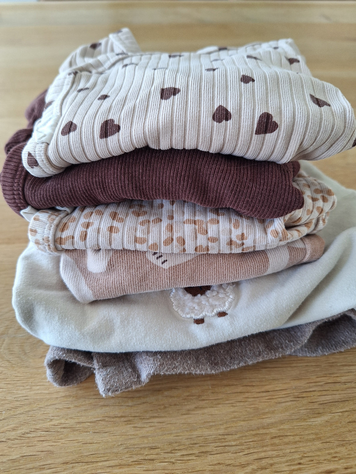 Naamslinger van babykleding via wachtlijst