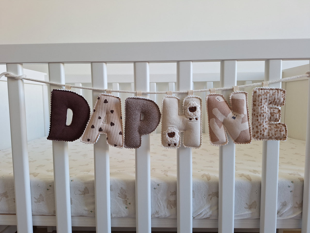 Naamslinger van babykleding via wachtlijst