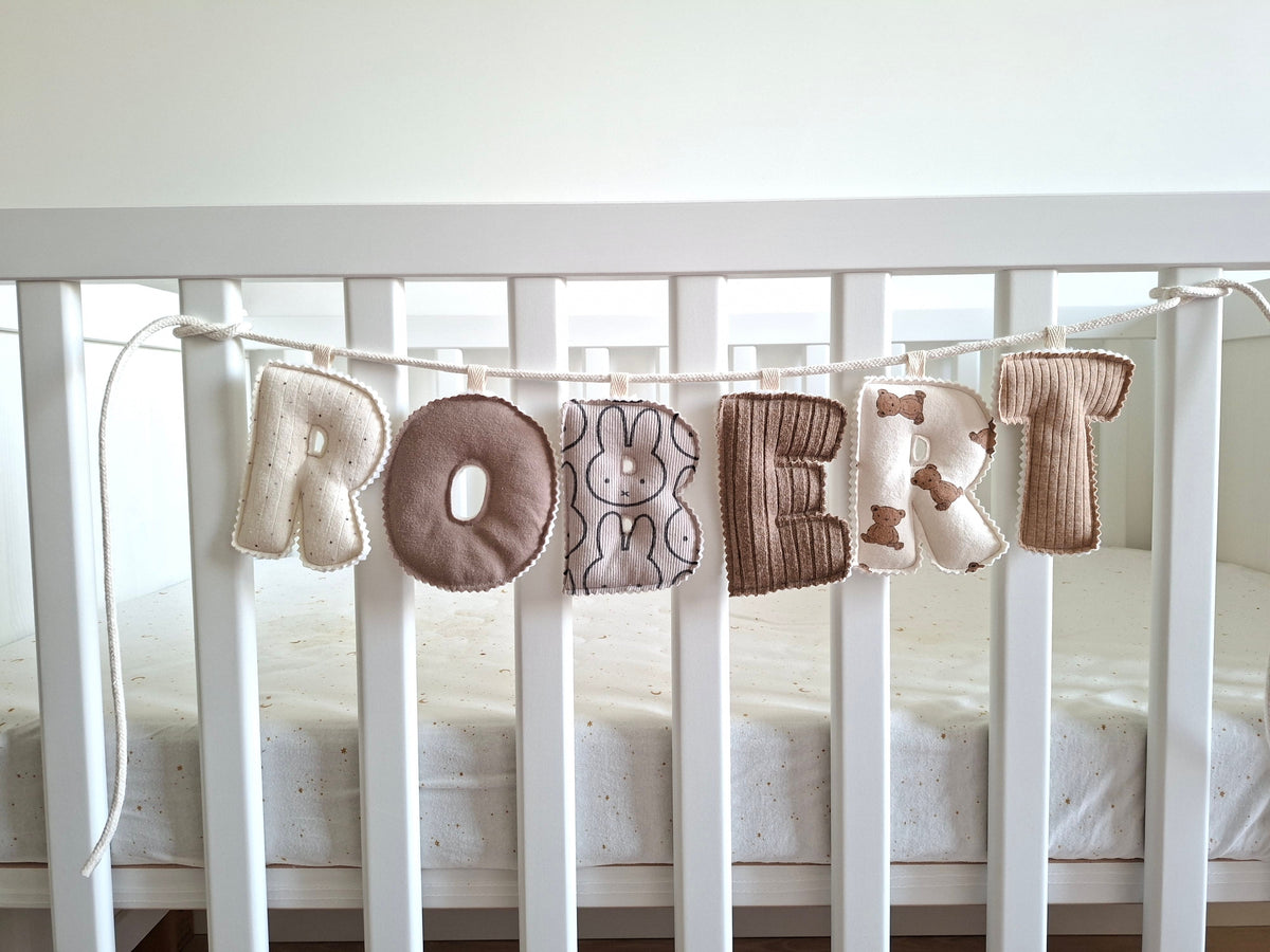 Naamslinger van babykleding via wachtlijst
