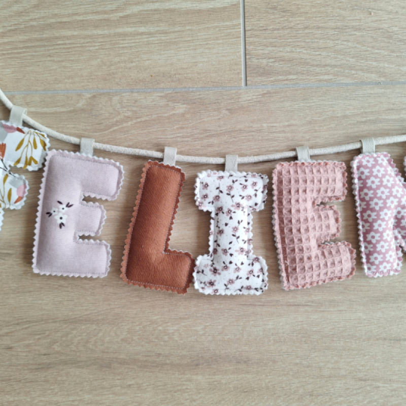 Naamslinger (per letter)